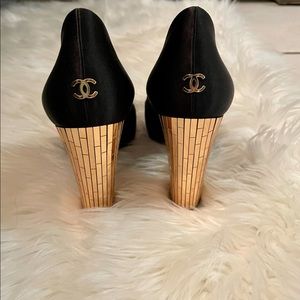 Black and gold CHANEL heels.